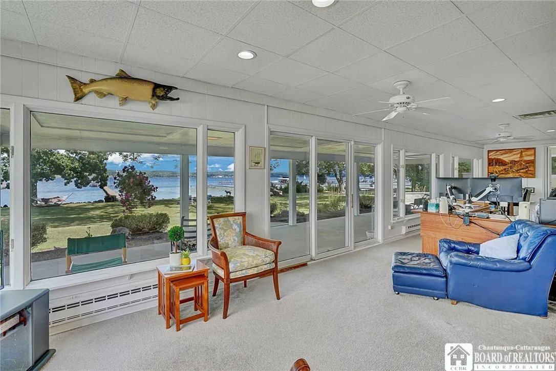 The Dining Area opens to an enclosed and  heated 40\' sunroom