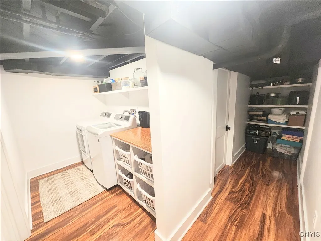 Lower Level laundry, storage and utility room pictured
