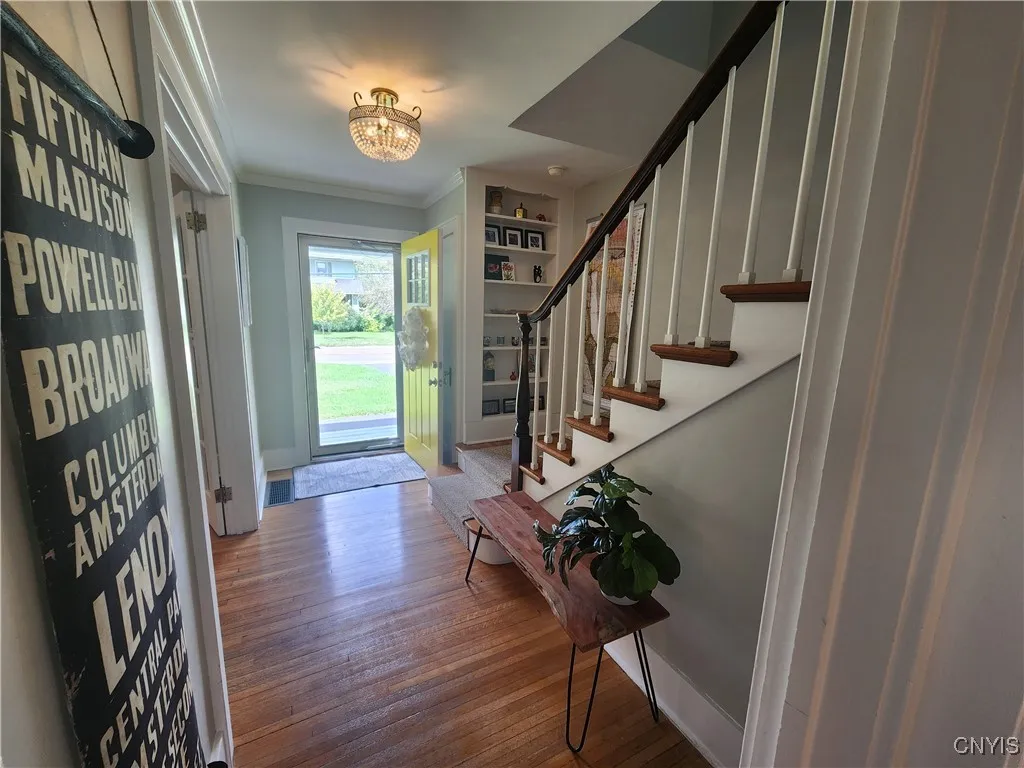 Open staircase foyer at front door