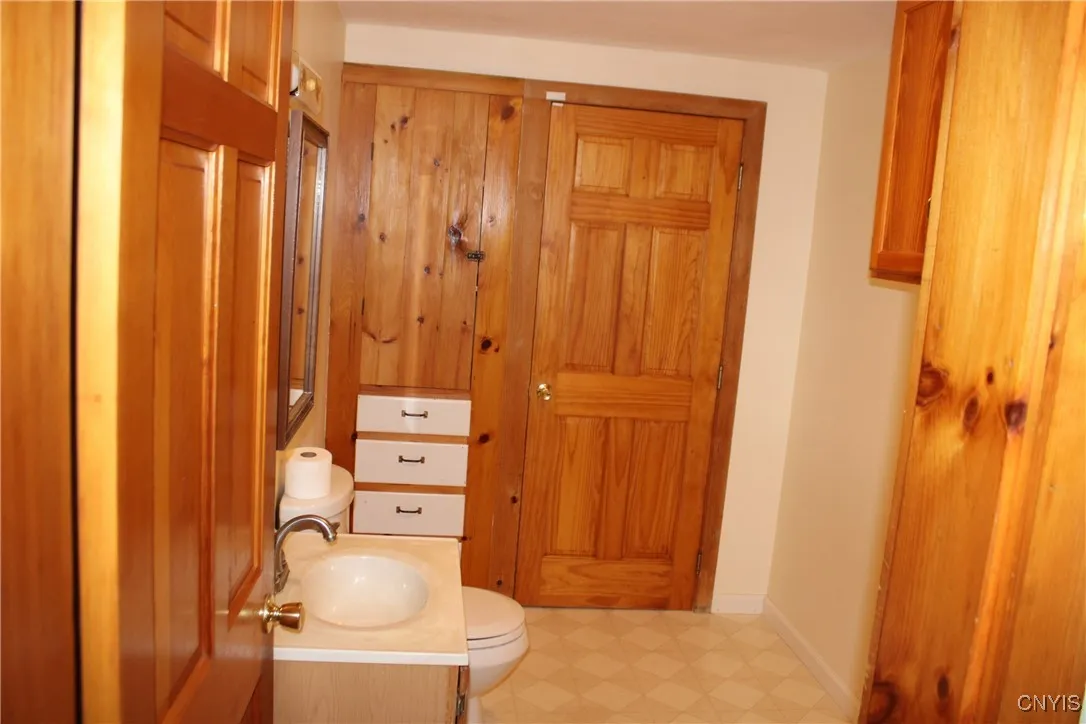 HALF BATH & LAUNDRY FIRST FLOOR OFF KITCHEN