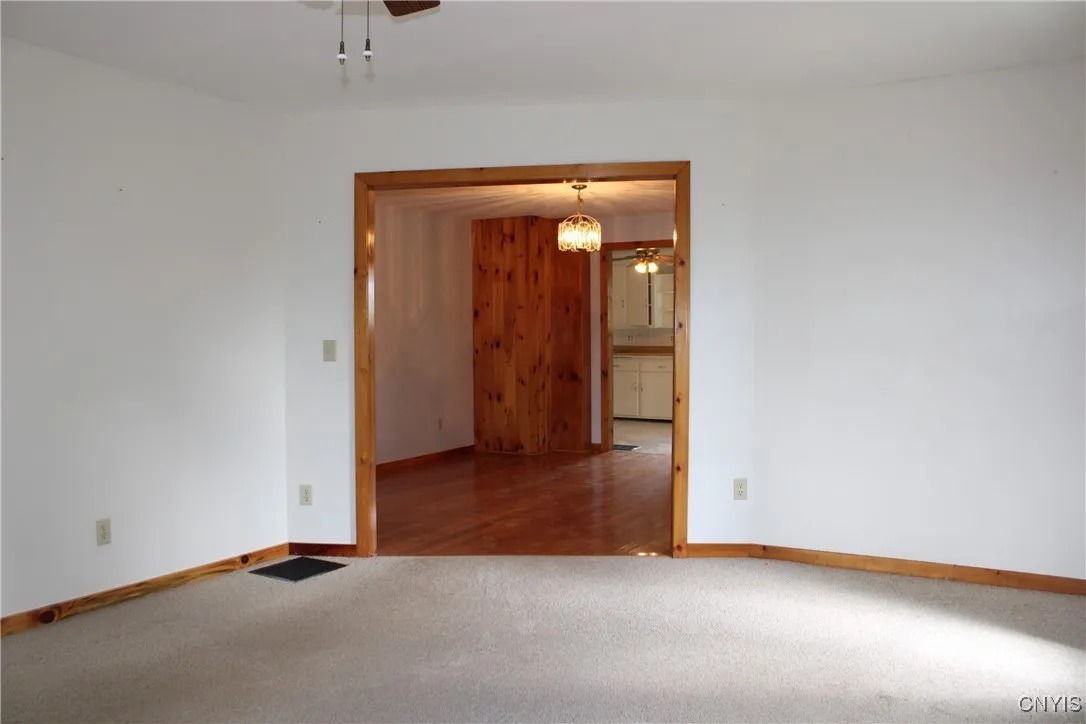 FRONT/TV ROOM LOOKING BACK TO DINNING ROOM