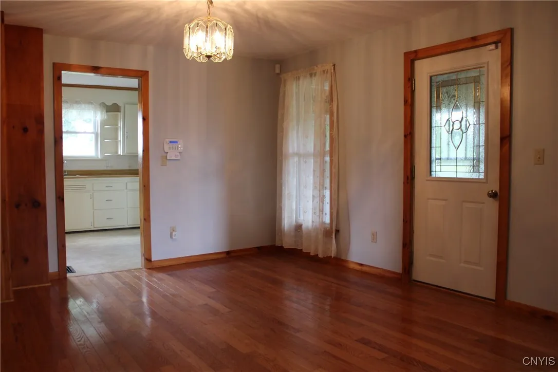 DINING ROOM-ENTRY ENTRY INTO KITCHEN, FRONT PORCH & TV ROOM