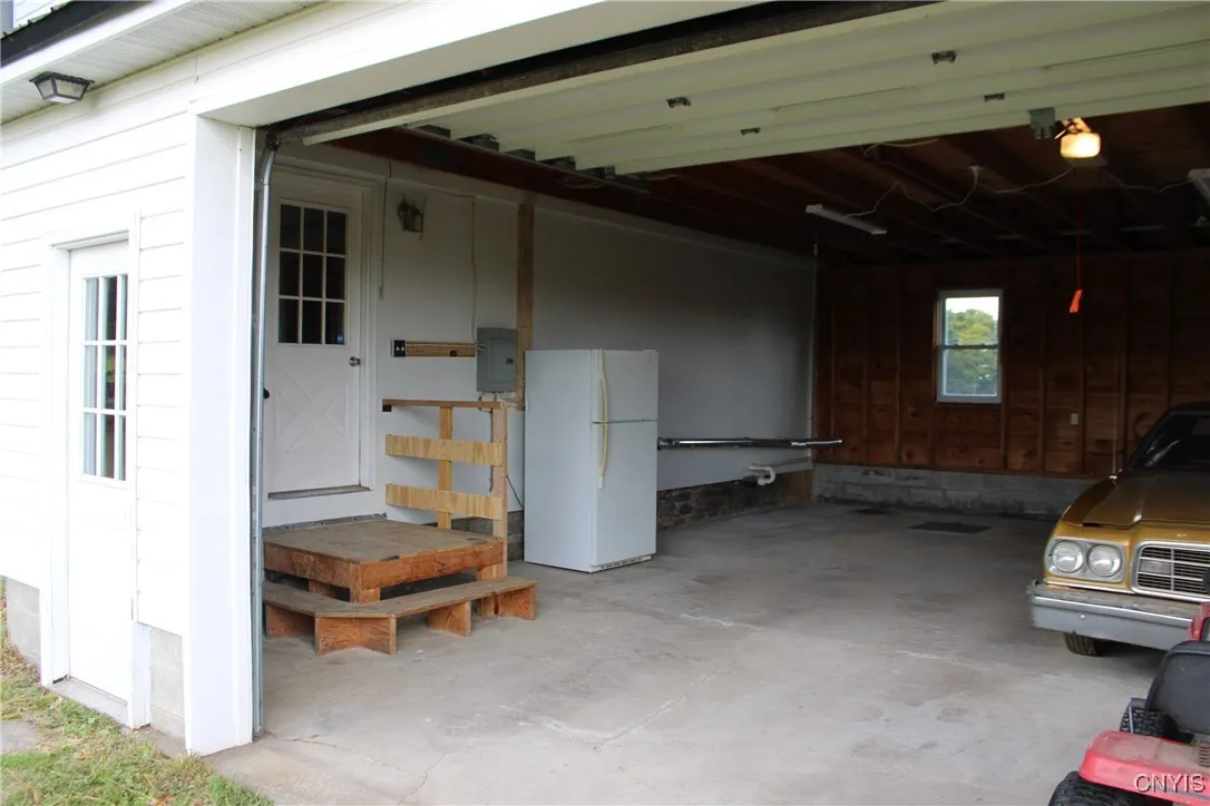 GARAGE UP STAIRS TO KITCHEN