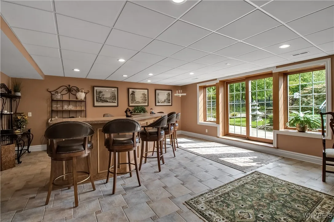 Bar & bathroom with outside access from the pool area.