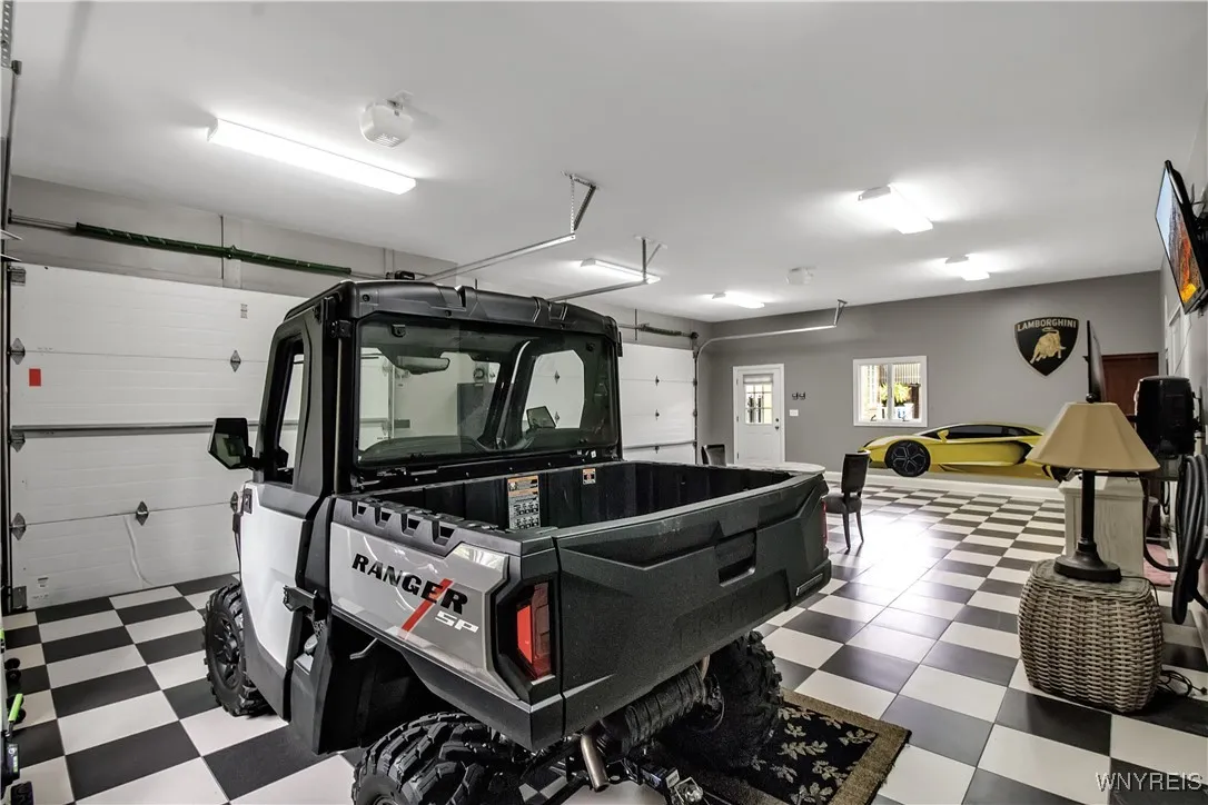 3 car garage with EV charging station