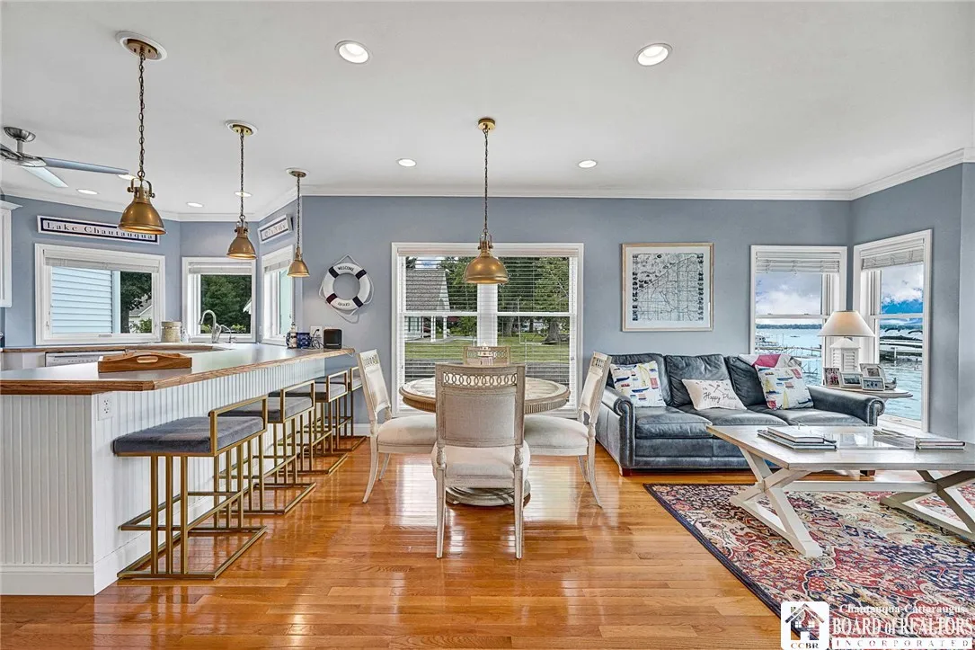 the layout flows to the 3rd living area, complete with a second kitchen and room for dining as well.