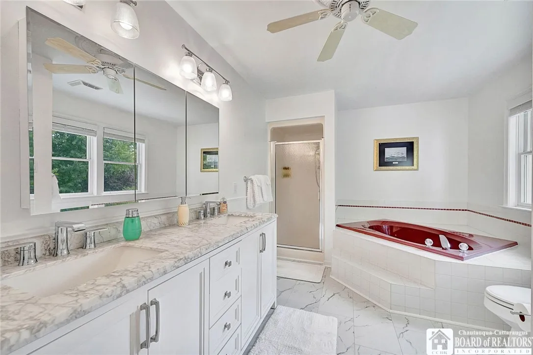 plus a gorgeous bath with a separate whirlpool tub and double sinks.