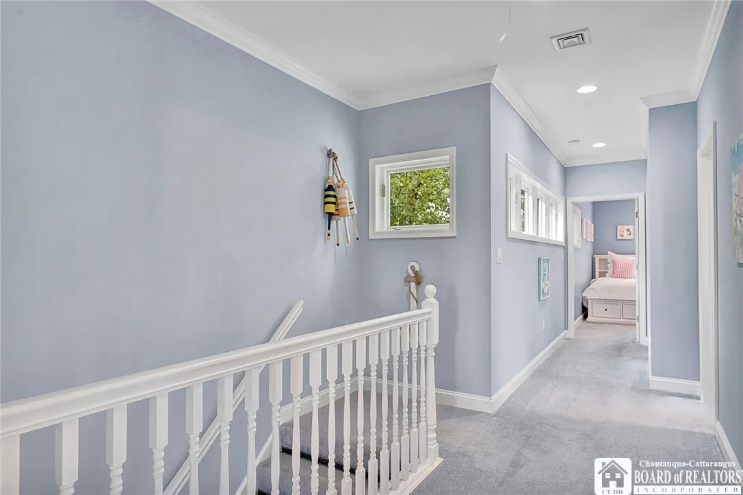 Upstairs are 3 more Bedrooms, a large linen storage room, and two more baths.
