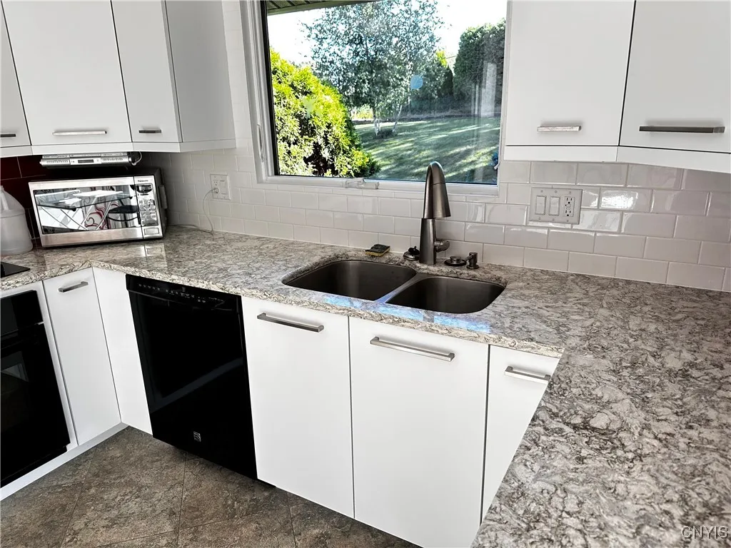 kitchen sink looking to back yard