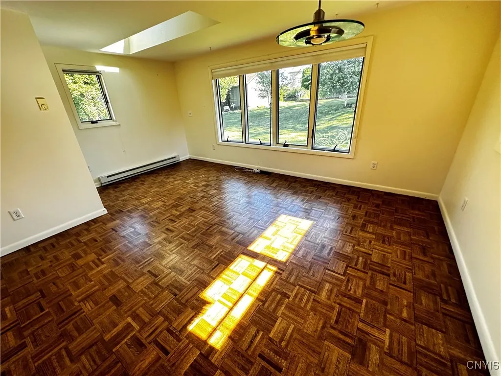 bedroom three with view to back yard