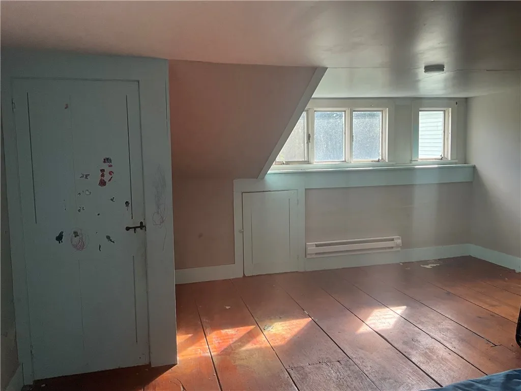 Bedroom at top of circular stairs