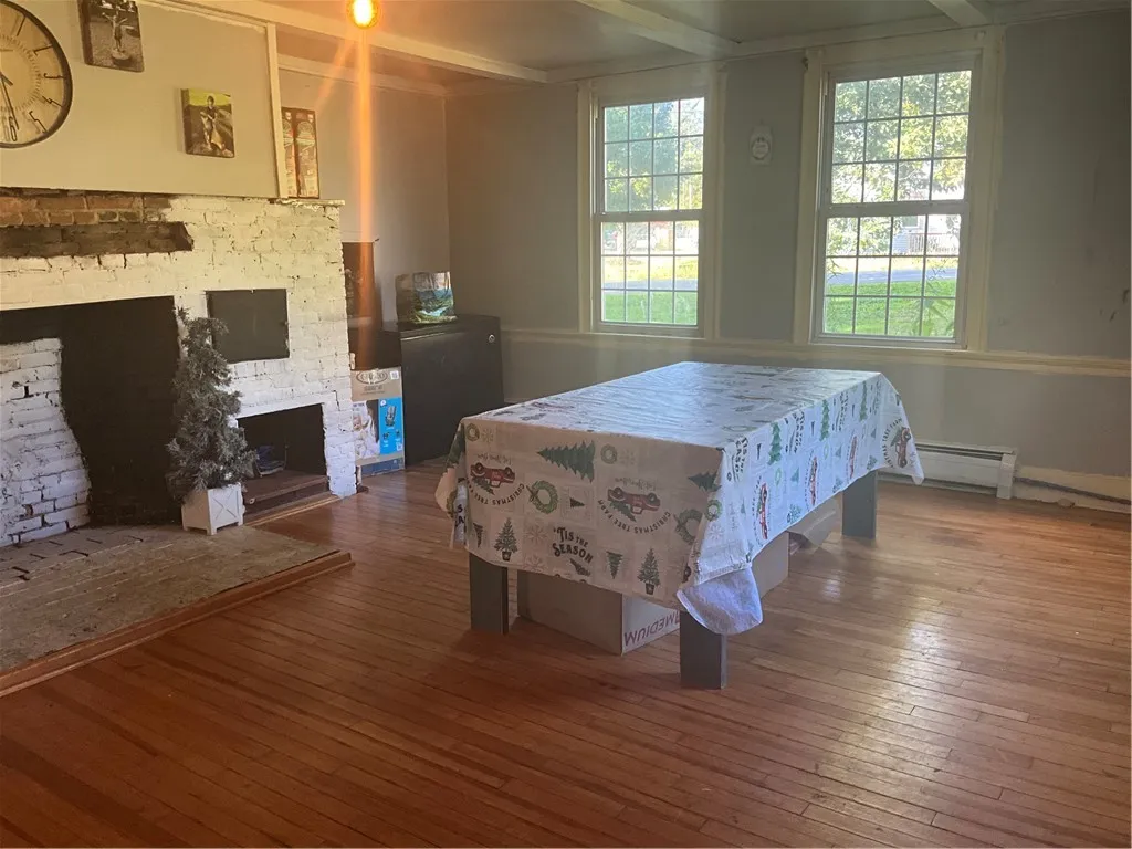 Eat in kitchen with glorious hardwood floors throughout