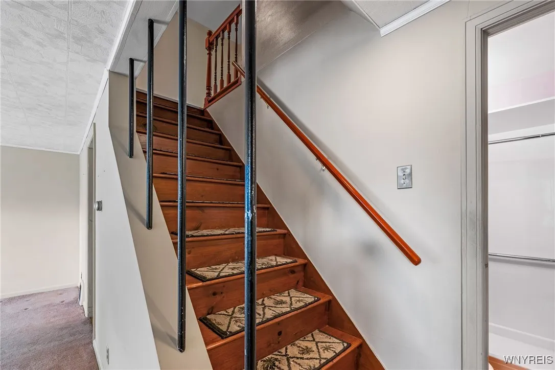 stairway from liiving room to floor​​‌​​​​‌​​‌‌​‌‌​​​‌‌​‌​‌​‌​​​‌​​ 2