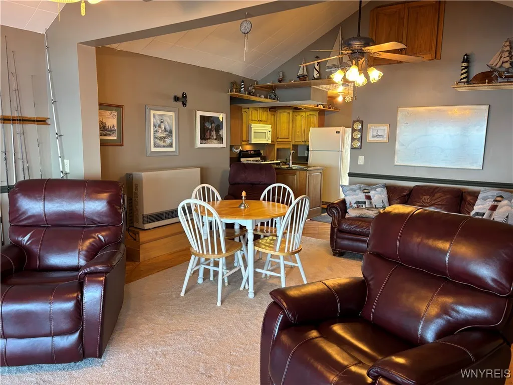 View from Sunroom area to Living Room Area and into kitchen