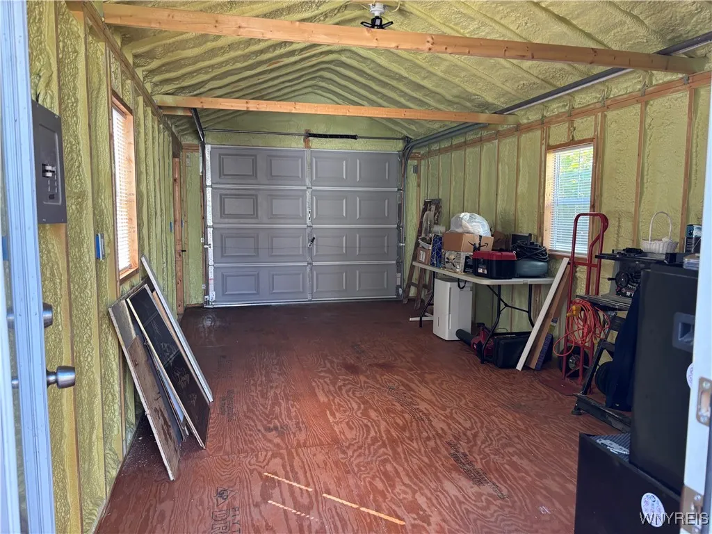Fully insulated 1.5 car garage - view from rear man-door