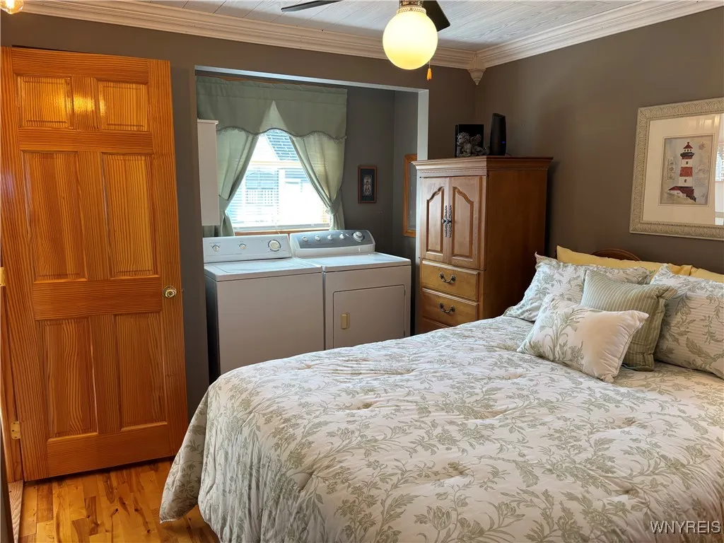 Spacious bedroom with washer/dryer and plenty of storage space