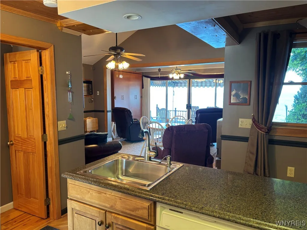 View from kitchen to LR/Sunroom area