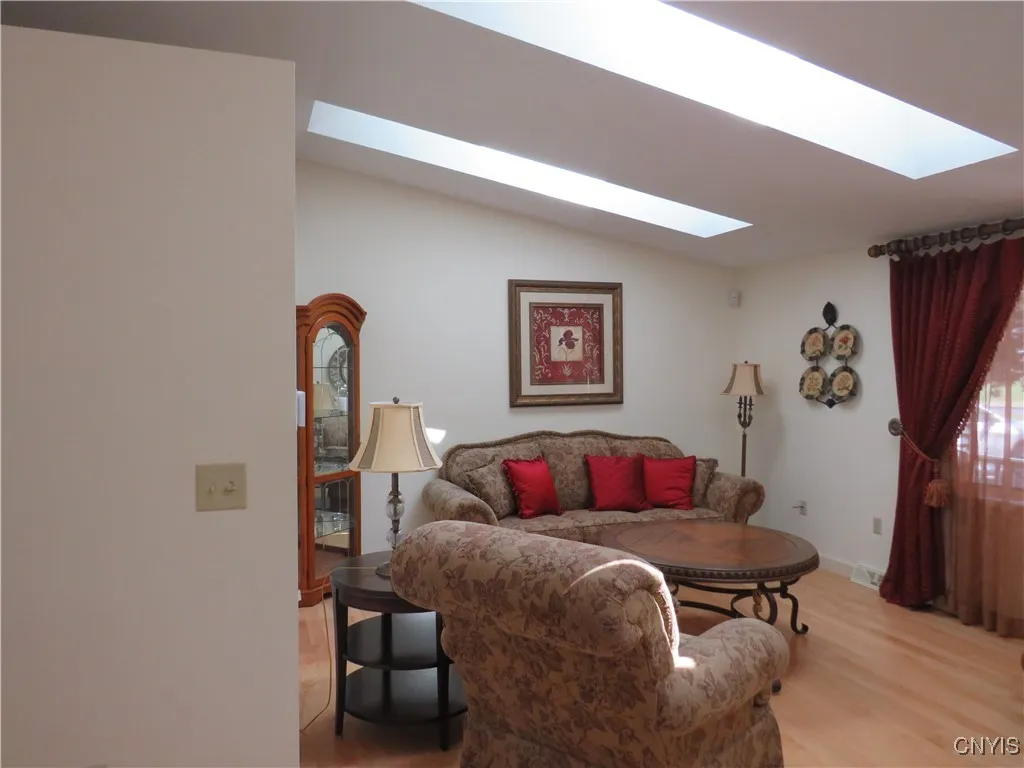 Bright front living room with skylights
