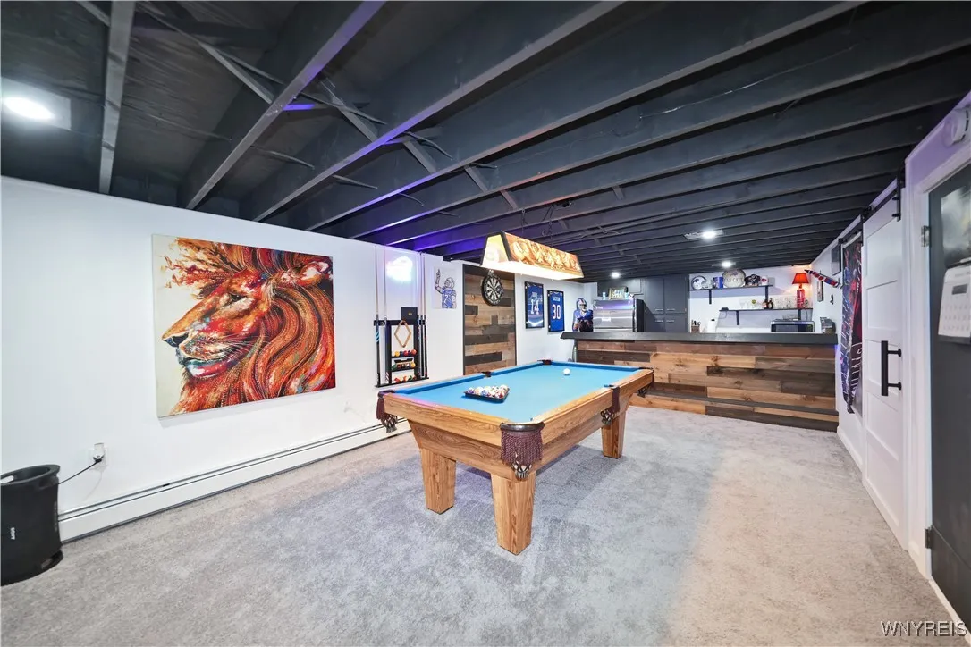 Gorgeous finished basement with wall to wall carpeting and large dry bar. Pool table included.