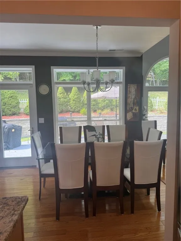 Dining room 1 with view of back deck