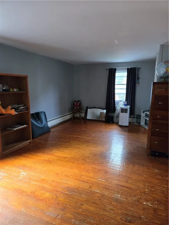 Spacious 3rd bedroom with hardwood floors