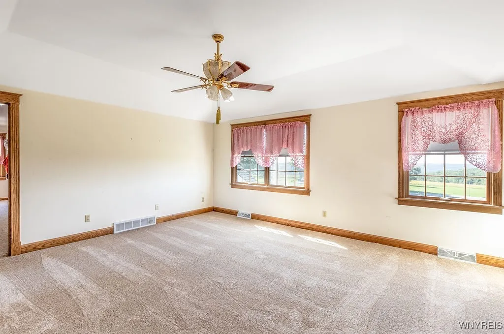 Primary suite with large walk-in closet and primary bathroom