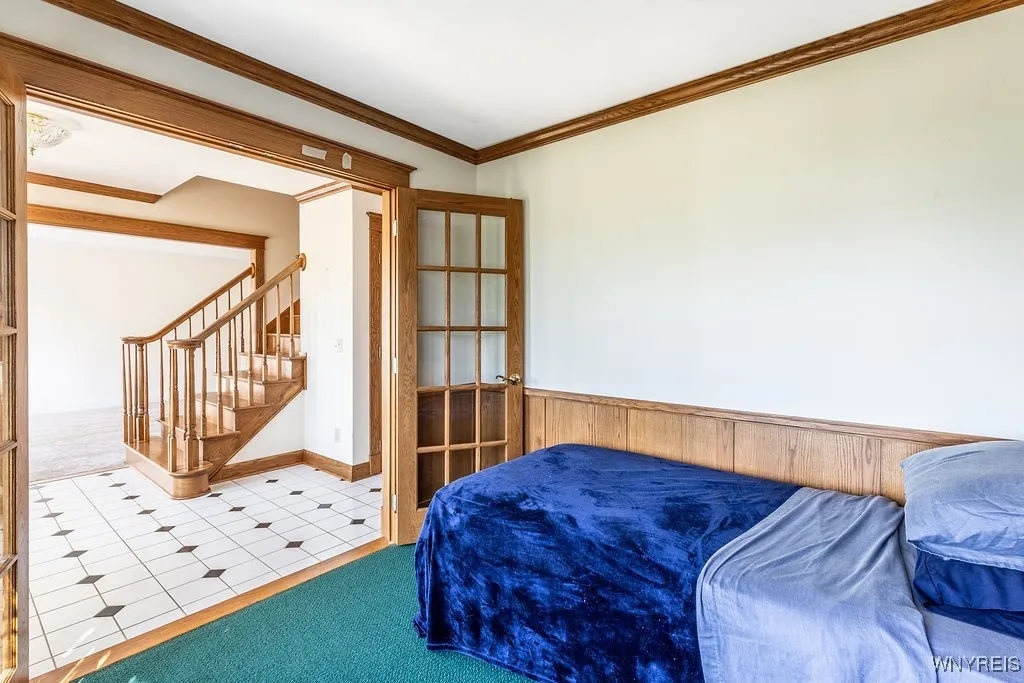 Front den/currently being used as a first floor bedroom