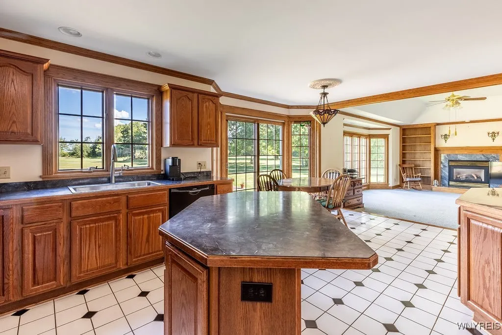 Kitchen with dinette area into family room
