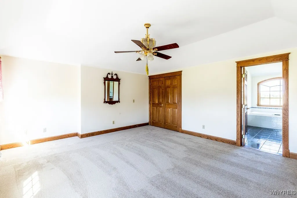 Primary bathroom with jacuzzi tub and separate shower
