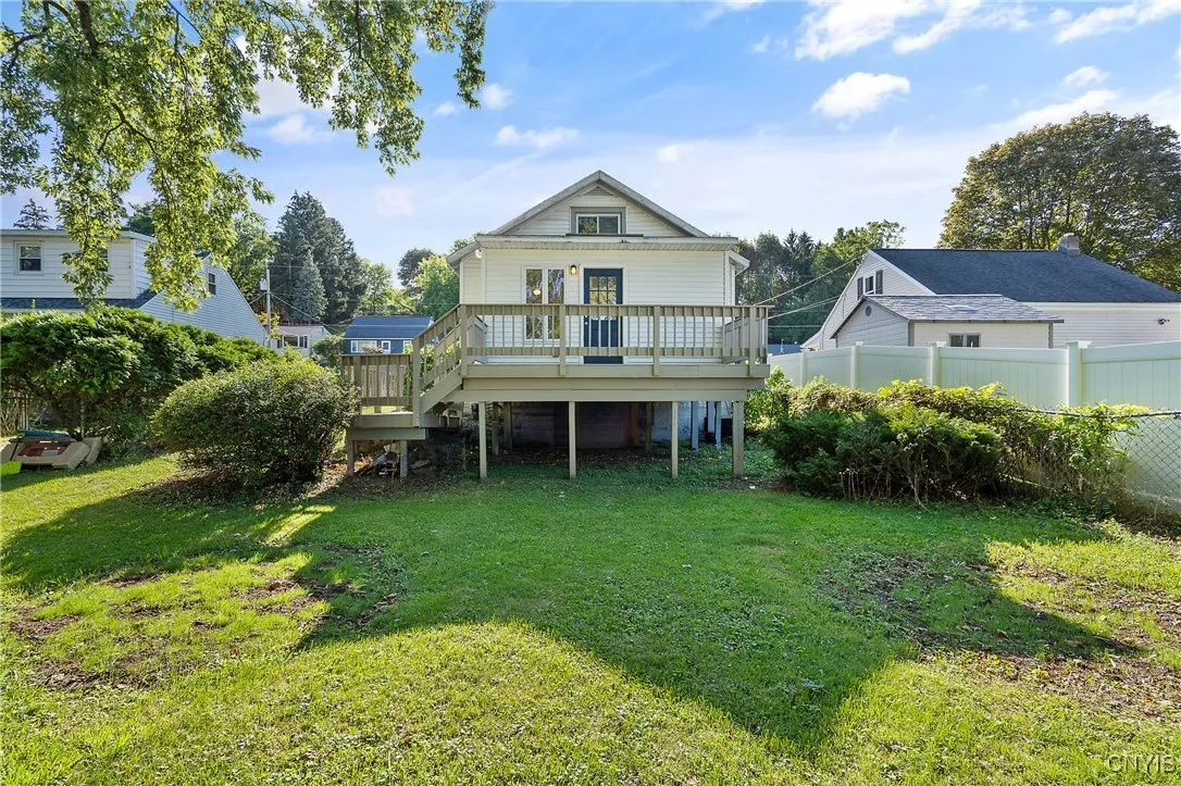 Old growth flora and the perennial landscaping make this yard a beautiful suburban oasis to be enjoyed!