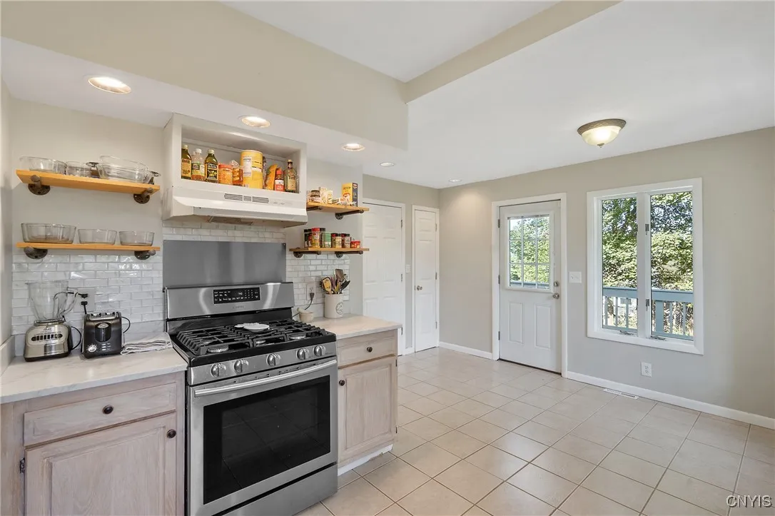 The chef of the house is sure to love this space with extra prep space found here on the opposite side of the room.
