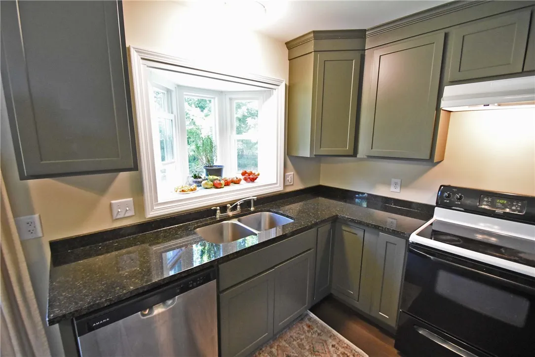 New Kitchen with nice bay window looking out over back yard.