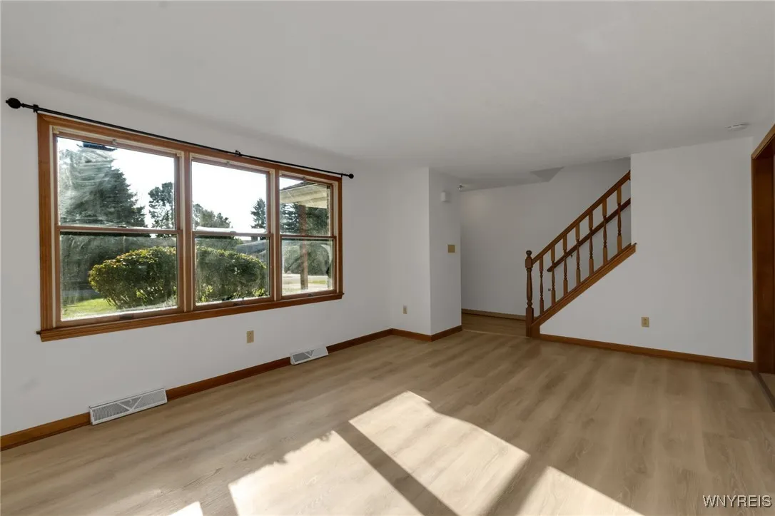 Unit A: Great size unit, large living room with access to Kitchen, half bath, 1st flr laundry, easy access to garage, staircase to 2nd floor 3-bedrooms and full bath.