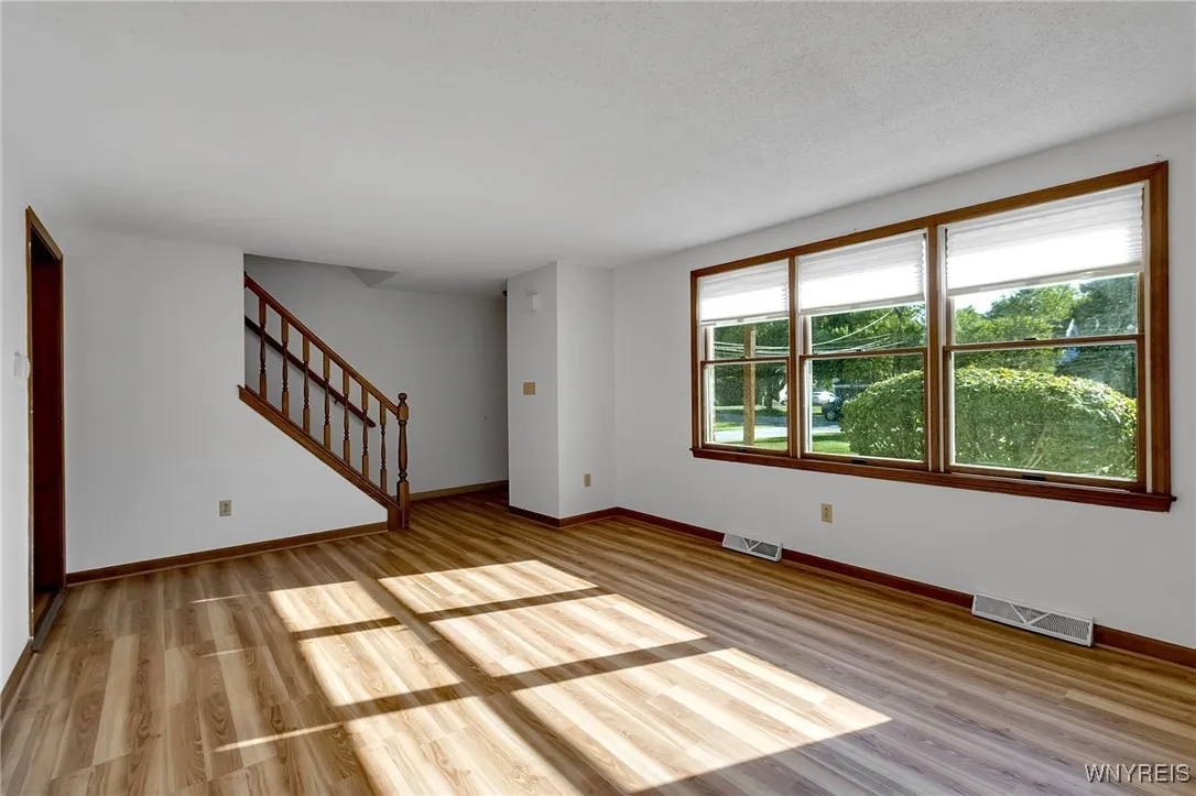 Unit B: Great size unit, large living room with access to Kitchen, half bath, 1st flr laundry, easy access to garage, staircase to 2nd floor 3-bedrooms and full bath.