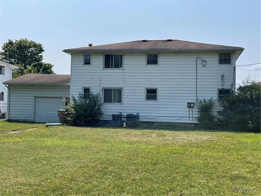 Rear of House.  Note garage has additional rear garage door.