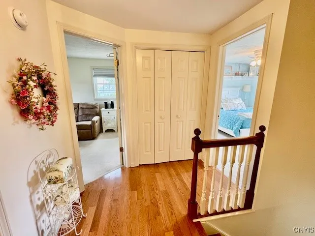 Upstairs landing w/ double linen closet