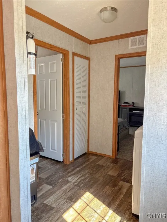 Laundry area/hallway to second bed and bath