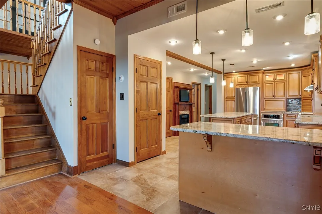 Spacious Updated Granite Kitchen with center island and upgraded appliances