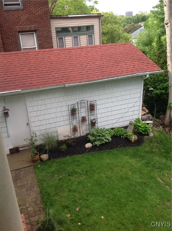 ** BACK SIDE YARD VIEW OF GARAGE**