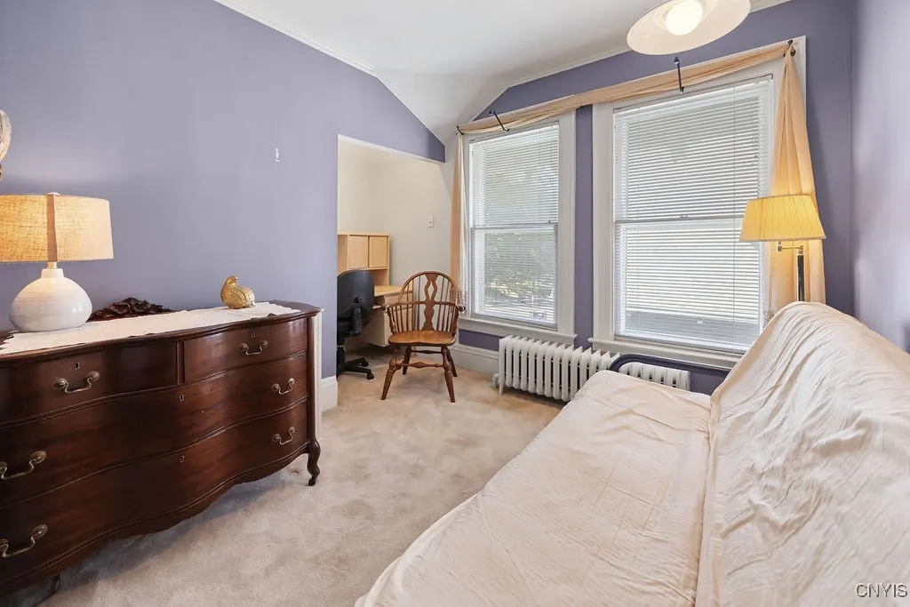 BEDRM #1  USED AS GUEST ROOM* TV ROOM OFFICE**** TWO BIG WINDOWS **CUT OUT FOR DESK **  2 DOORS ** ONE TO MAIN FOYER UPSTAIRS *OTHER TO BACK STAIRCASE TO KTCHEN**