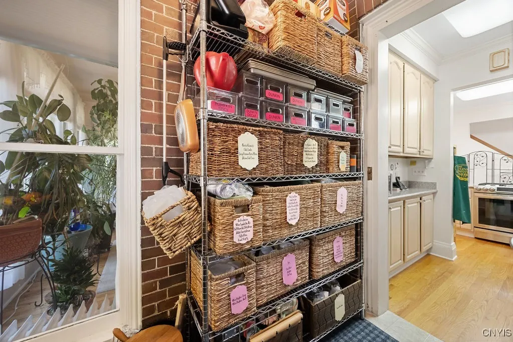 ***VIEW OF INSIDE PANTRY (LARGE PORCH REMODELED INTO PANTRY AND OFFICE AREA)  ROOM HAS TWO WINDOWS...SO DARN CHARMING !