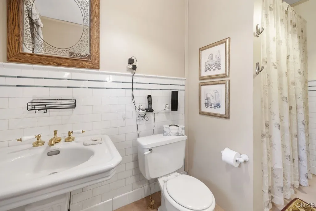 *** WONDERFUL FULL BATH** SHOWER AND TUB  NOT IN PHOTO TO RIGHT BEHIND SHOWER CURTAIN
