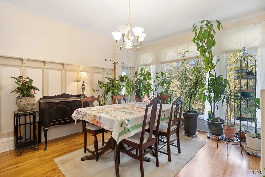 *** DINING ROOM FEATURES A WALL OF WINDOWS OVER LOOKING YARD***