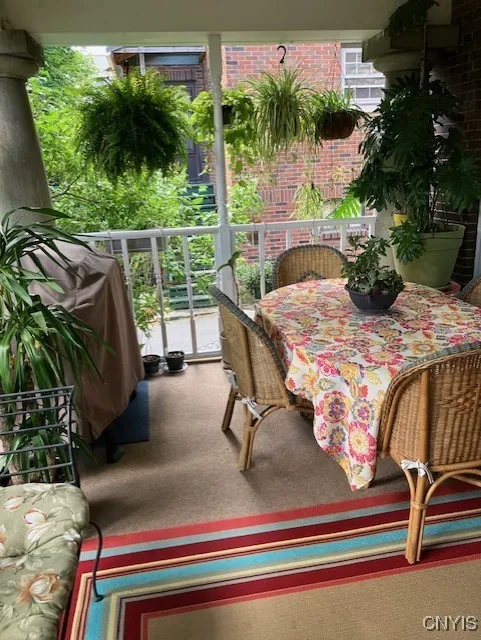 **LOVELY PORCH OFF LIVING ROOM AND DINING*