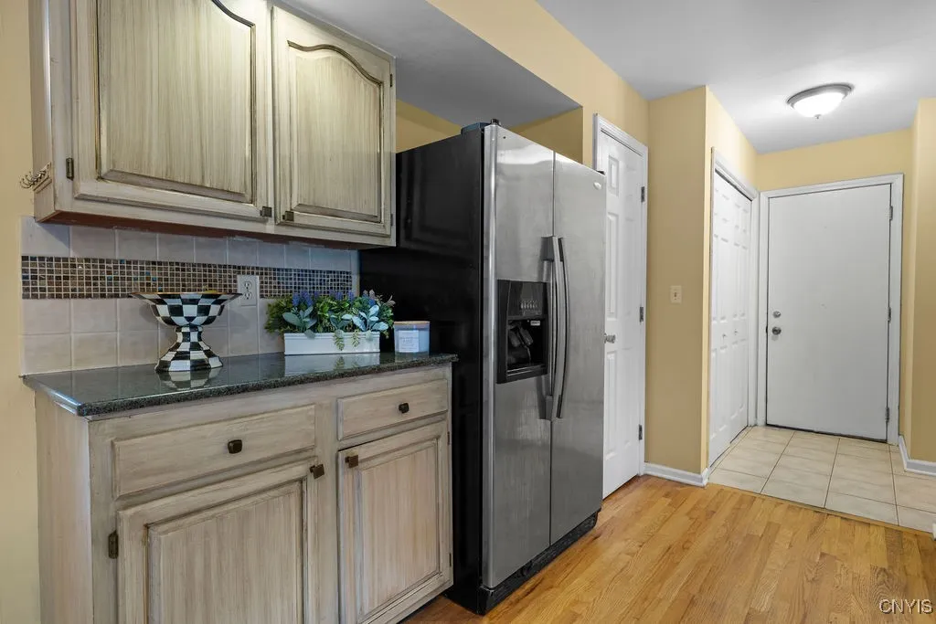 Left door is the pantry and the double doors is the first floor laundry