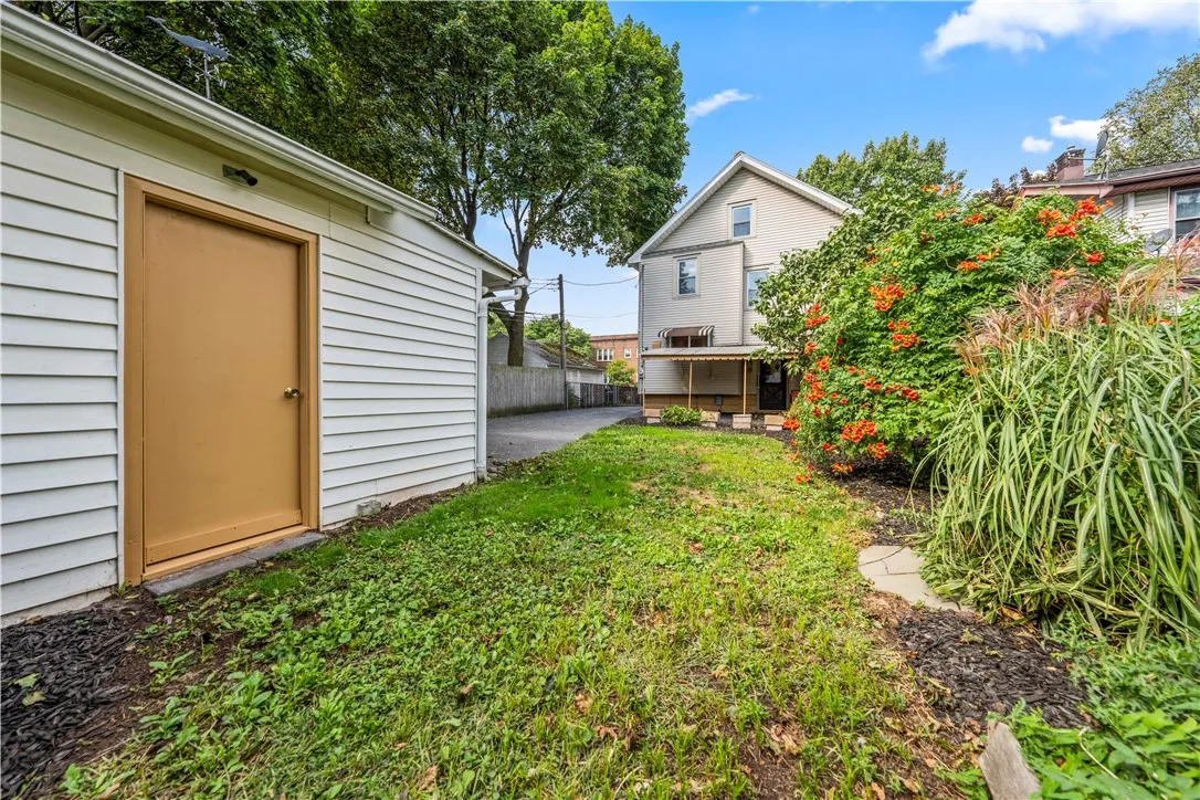 Side door to garage from back yard