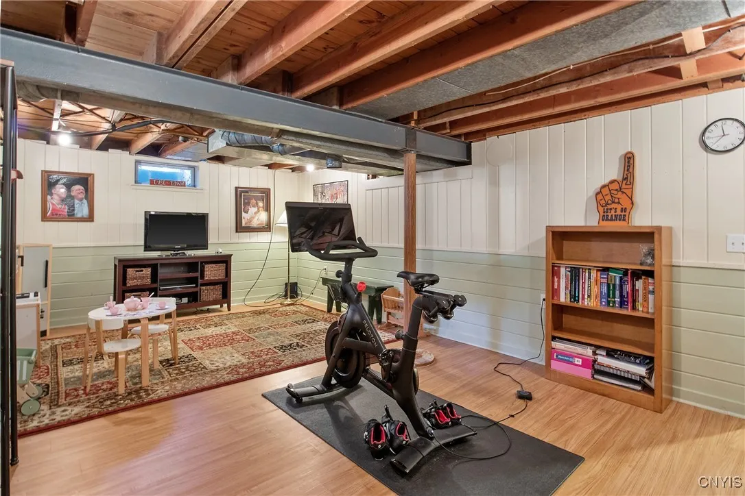 Tongue & groove wood painted walls with laminate flooring