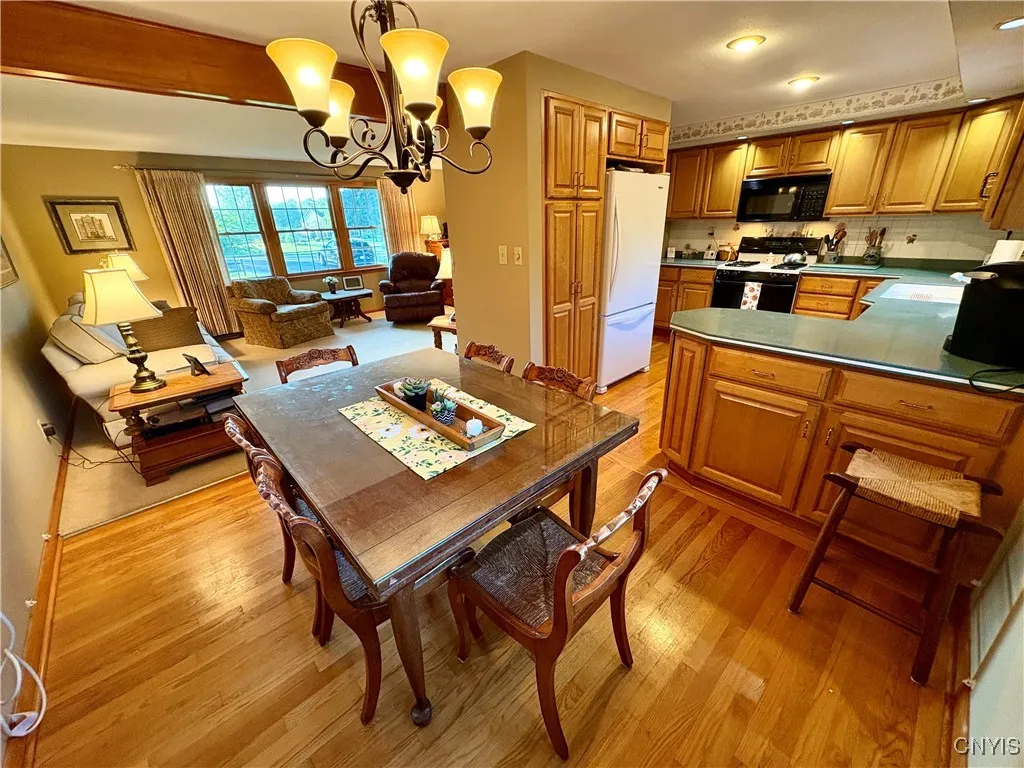 View from dining to kitchen and living room