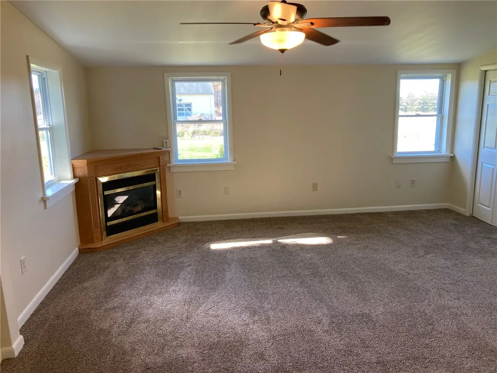 1st Floor Primary Bedroom With Walk In And Double Closets And Gas Fireplace