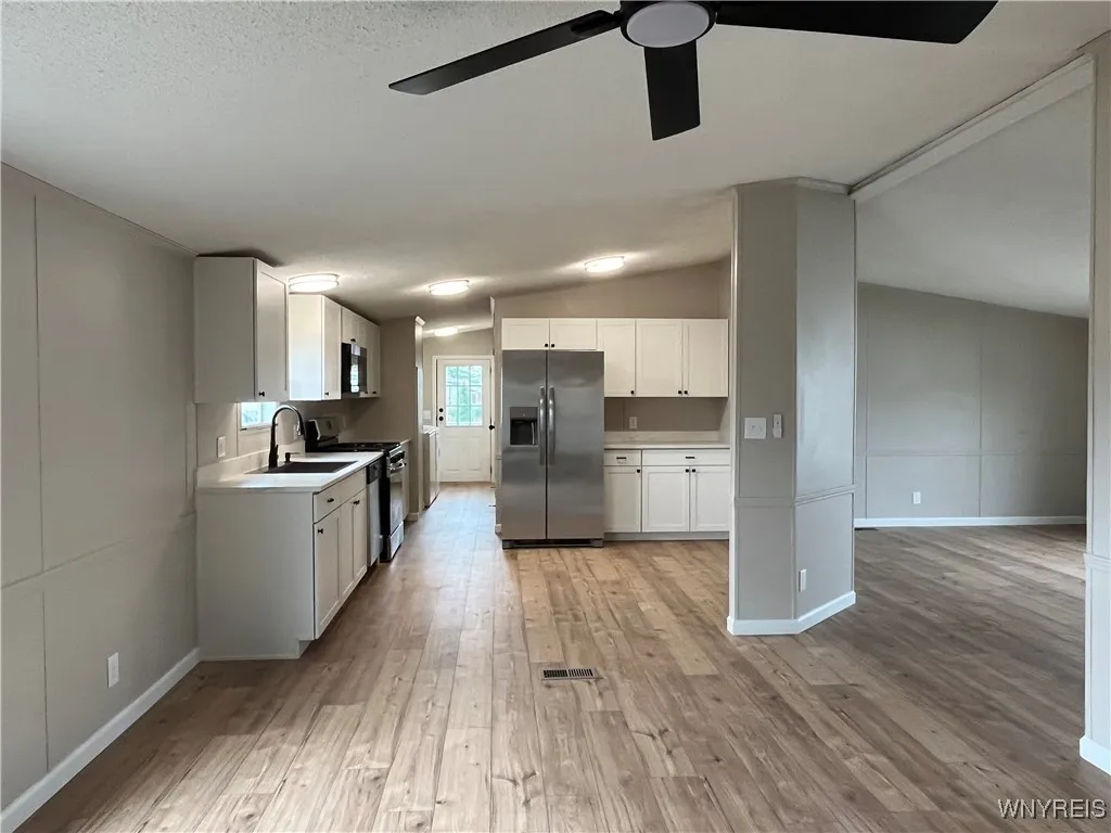 All new counter tops and cabinets